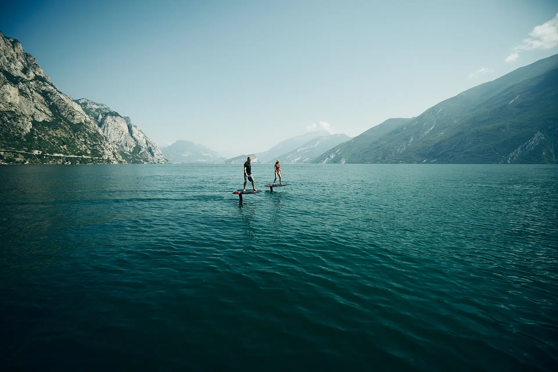 couple on e-foil at Lake Garda